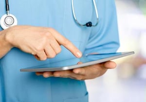 doctor-using-tablet